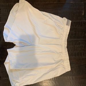 White lululemon shorts surge